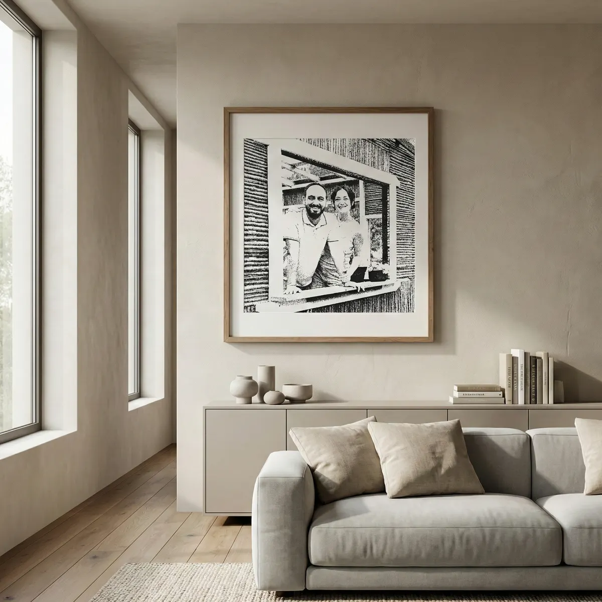 A couple's portrait made of letters hanging in a living room