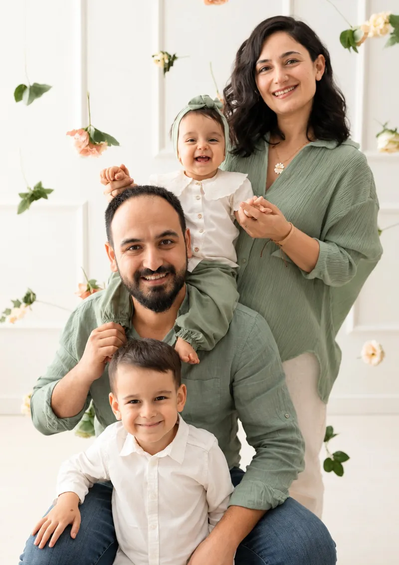 The family photo to be turned into the artwork: mother, father and two children